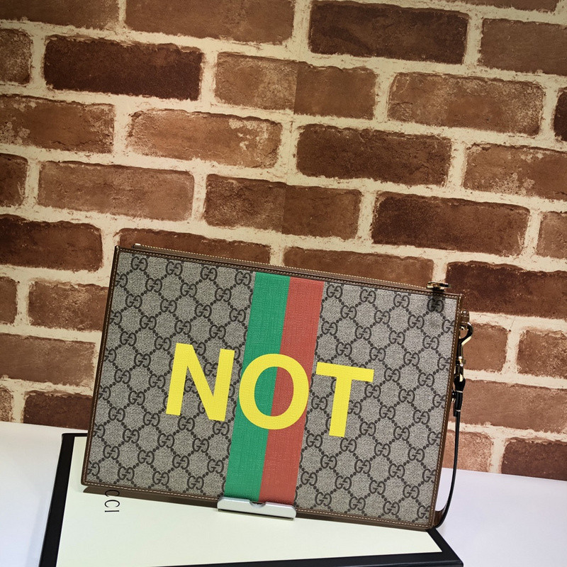 G*u*i clutch bag