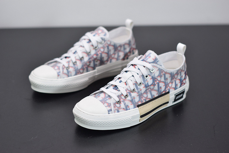 dio* b23 low-top sneaker in blue & red oblique